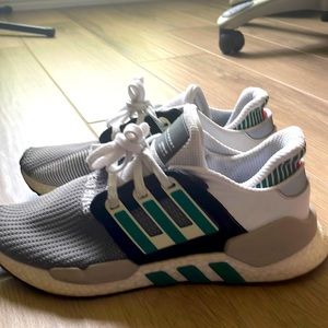 White/Black/Grey And Green worn normal wear.  Bought brand new .